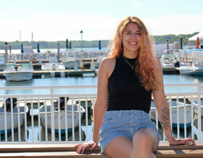 Ashley Carloni, web designer, digital marketer, and owner of Sandy Lotus Marketing.