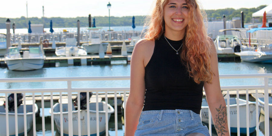 Ashley Carloni, web designer, digital marketer, and owner of Sandy Lotus Marketing.